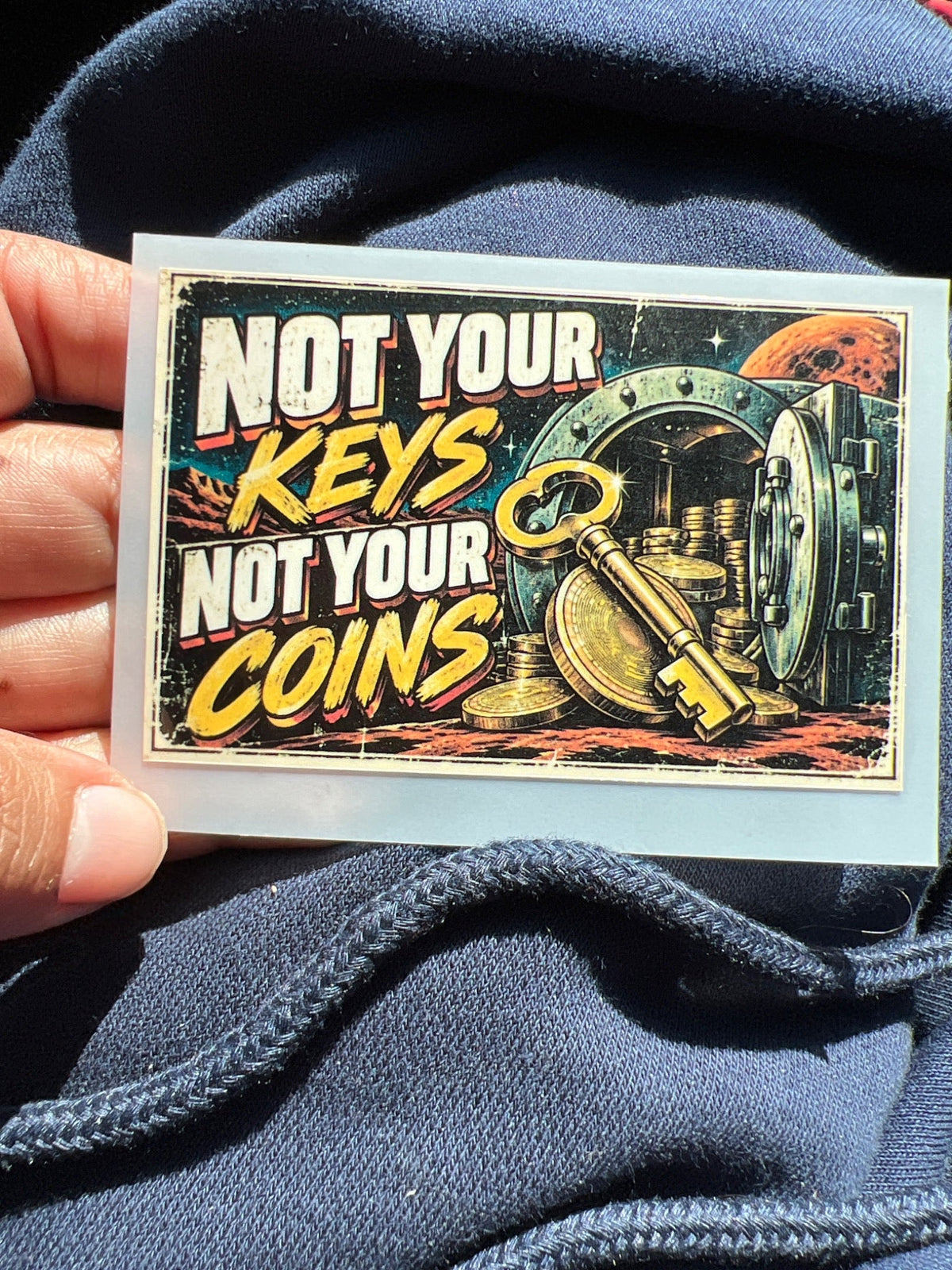 Actual rectangular Not Your Keys, Not Your Coins crypto sticker shown in hand